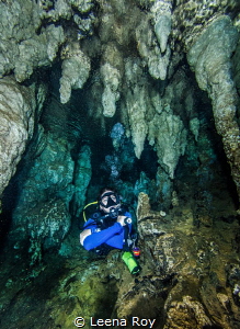 Diver in cave by Leena Roy 